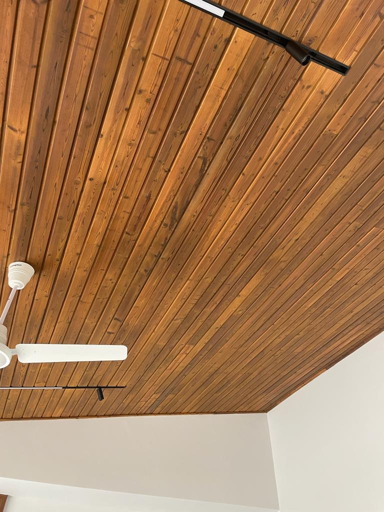 Wood ceiling and paneling by Elegance Living
